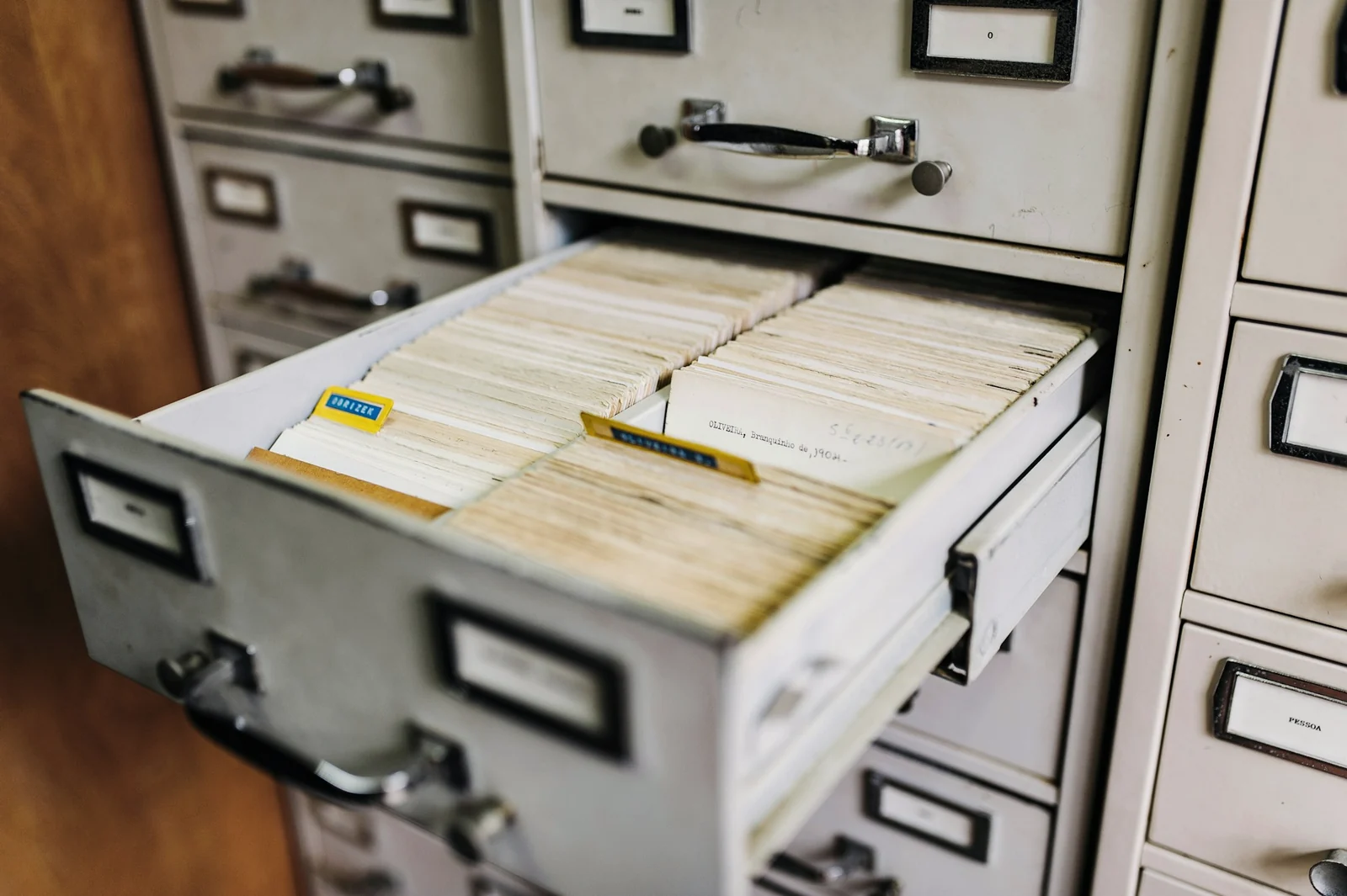 Open filing cabinet containing organised business records